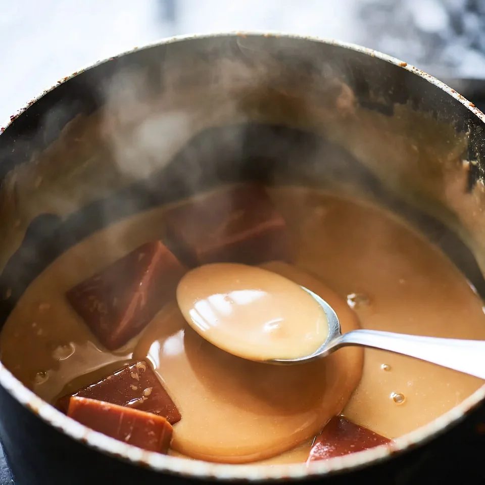 No Bake Salted Caramel Pretzel Bites 3 Melting caramel for no bake salted caramel pretzel bites