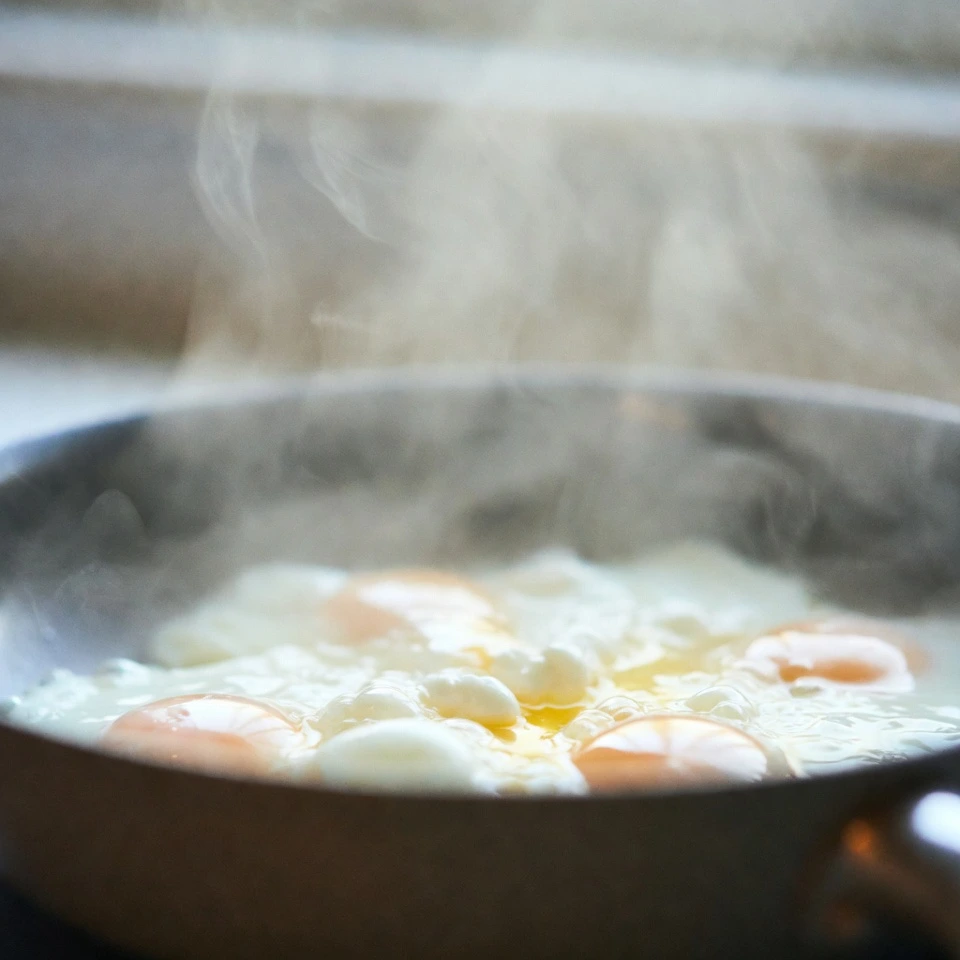 Hash Brown Breakfast Bowls 5 preparing the egg